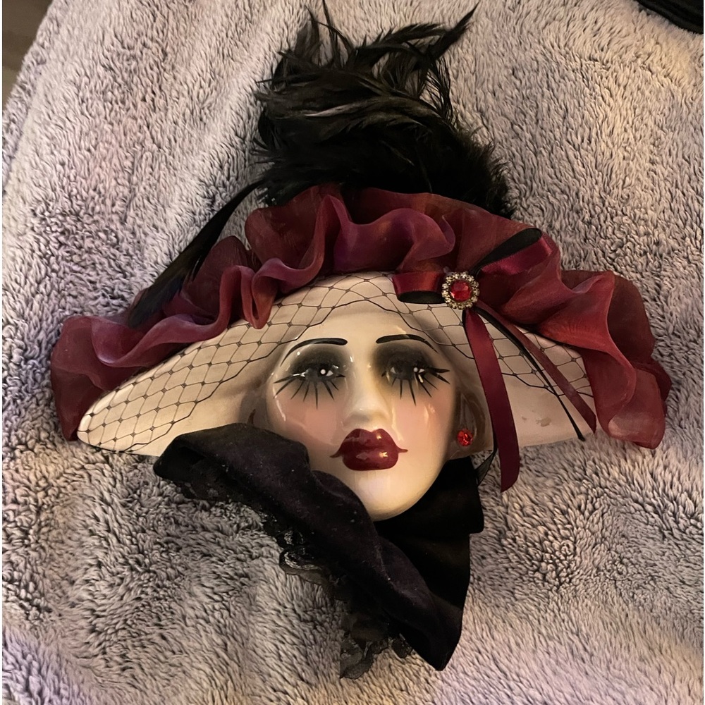 Ceramic woman’s face mask decor